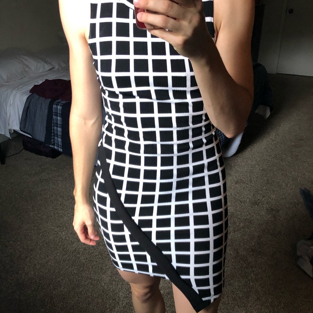 Asymmetrical body con black and white dress